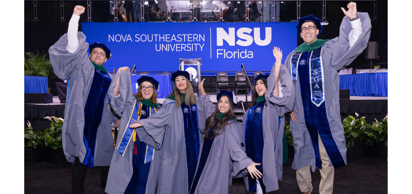 Students jump for joy after graduating