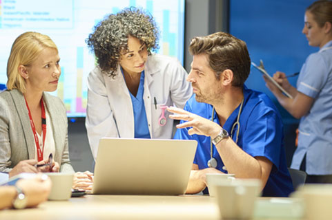 Doctors and residents discussing a case