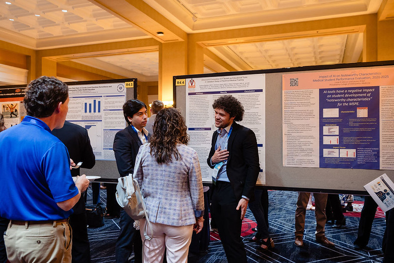 Group of people at the Poster Session Sip-n-Stroll