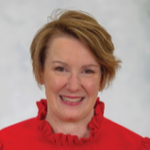 Dr. Sexton smiles in a professional headshot