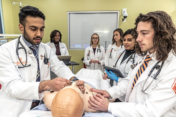 CUSOM students in sim lab