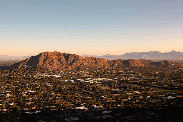 Arial view of Phoenix, Arizona with mountains in background