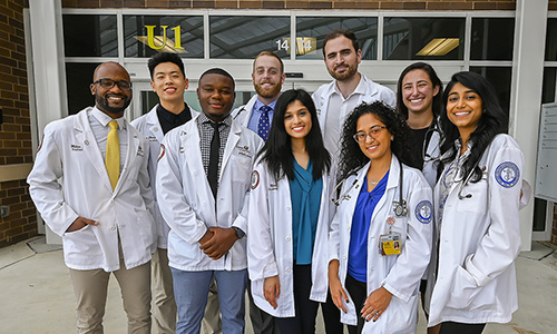 Smiling group of racially diverse medical students