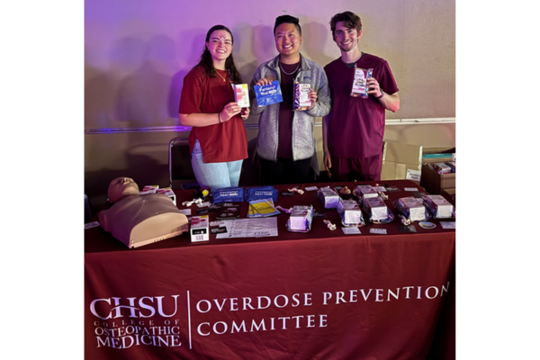 OPC offers its services to music festival attendees at the Fresno State University’s Glow in the Garden event. From left to right: Brooke Guenther, Phil De Vera and Ethan Kuss.
