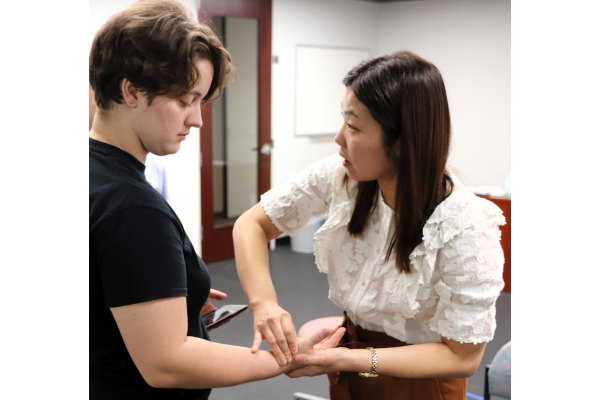 Dr. Lee treating a performing artist.