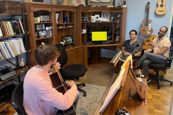Dr. Stephen Fung, Medical Director for Texas Ballet Theatre and former PAM fellow, observes a guitarist alongside Dr. Fuentes-Saavadre, who serves as the current PAM Fellow.