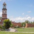 ViewoftheWestVirginiaSchoolofOsteopathicMedicineWVSOMcampuswithitssignatureclocktowerandopengreenspace