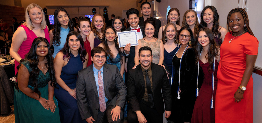 LMSA group holds up recognition certificate
