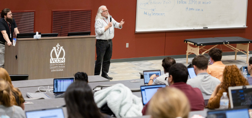 VCOM professor in lecture