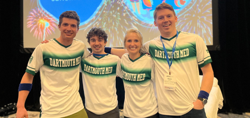 Four students representing the simulation team