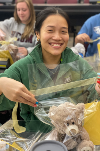 Student packages stuffed bear