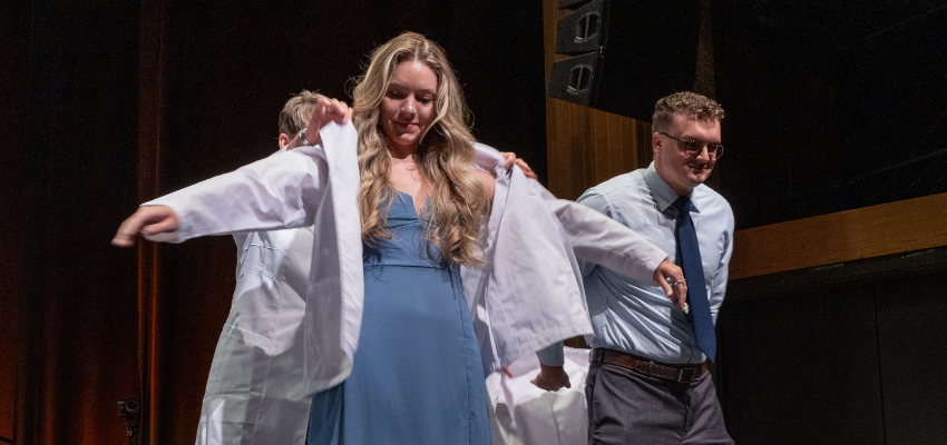 Student receives white coat