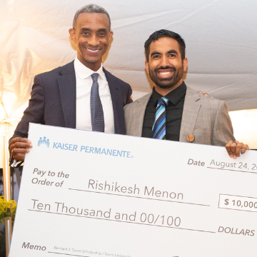 Rishikesh Prem Menon receives scholarship check