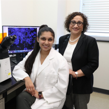 Rashmi Kaul, PhD, stands with her research student Sachi Pathak (left), a medical student at OSU-COM.