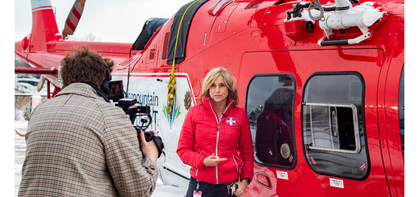 Woman filmed in front of helicopter