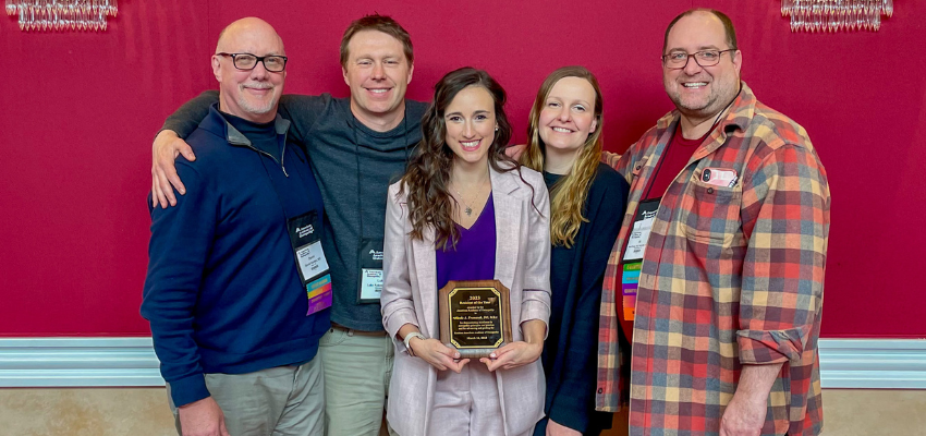 Dr. Fremarek surrounded by friends and colleagues