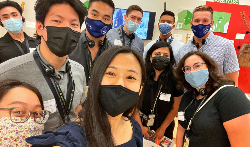 Diverse medical students pose for a selfie.