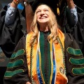 ChloeKilkutsstandssmilingwhilereceivingherdoctoralcloak