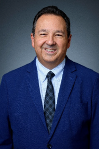 Professional headshot of David E. Garza, DO, MS, MEdL
