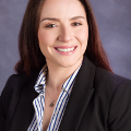 DrThorsmilesinablazerforaprofessionalheadshot