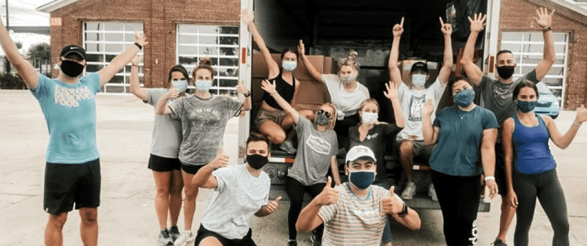 DMU students who participated in produce drive pose for a group photo