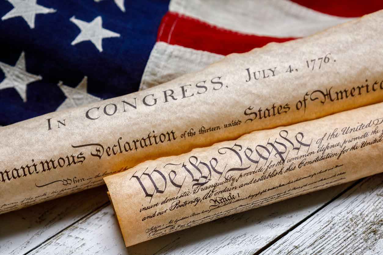 iStock-1291407945 parchment scrolls of declaration of independence and the U.S. constitutions