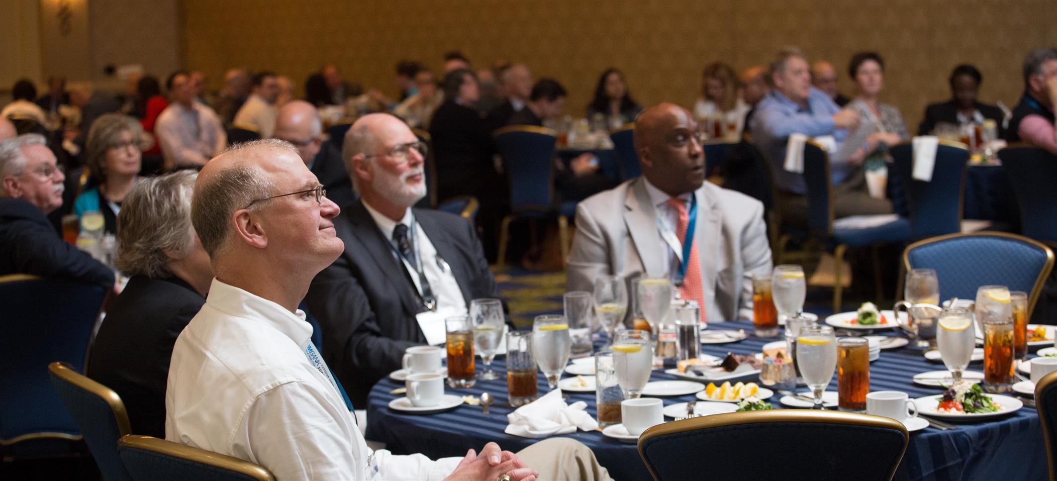 aodme_conference_2017 conference attendees listen to a speaker