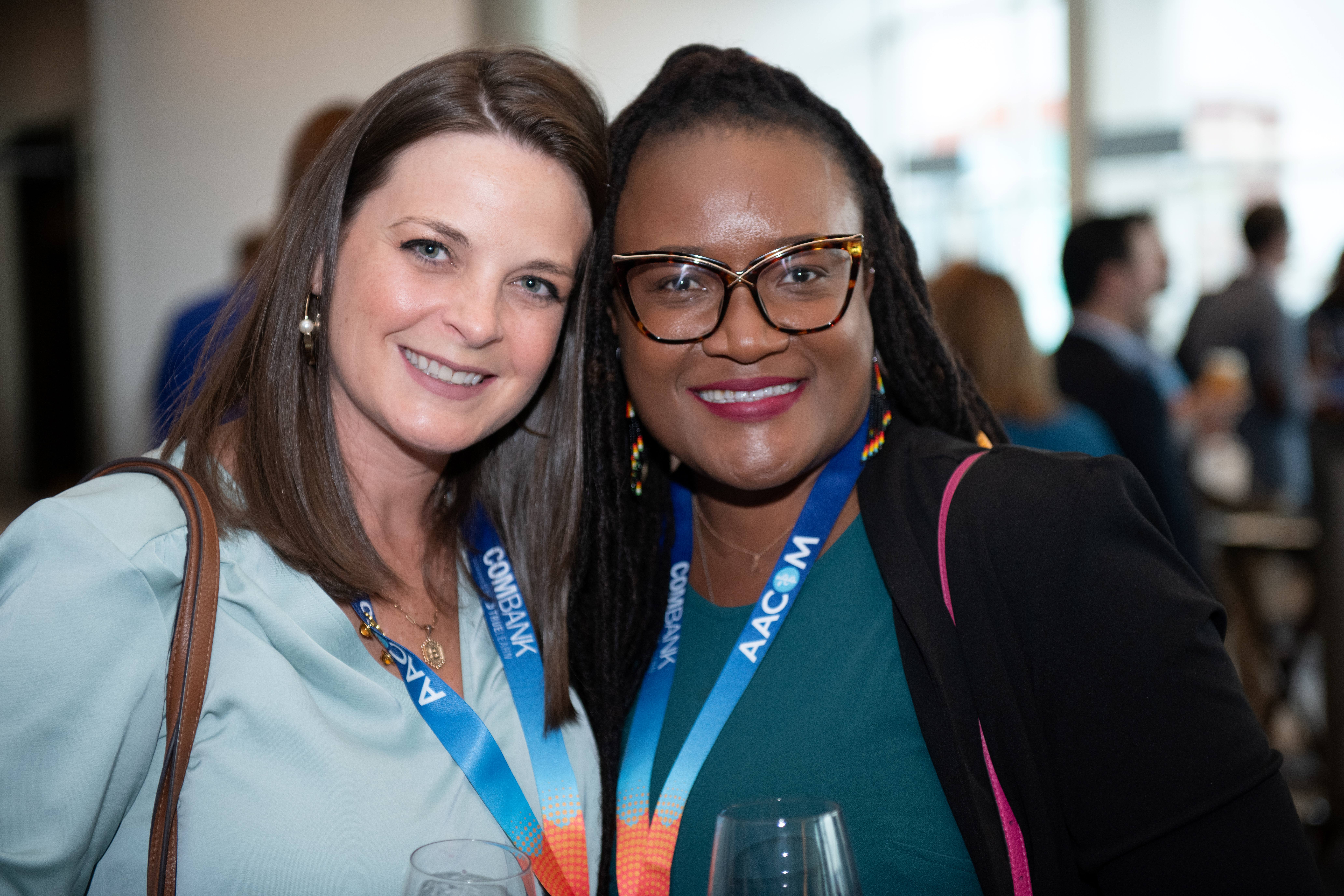 DSC_7313 Two woman enjoying Educating Leaders 2024