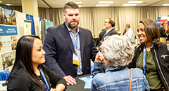 el22_exhibits-240x130 Conference attendees in the exhibit hall