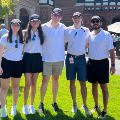 PCOMFacultymemberswithfourstudentsoutsidegolfcourseentrance